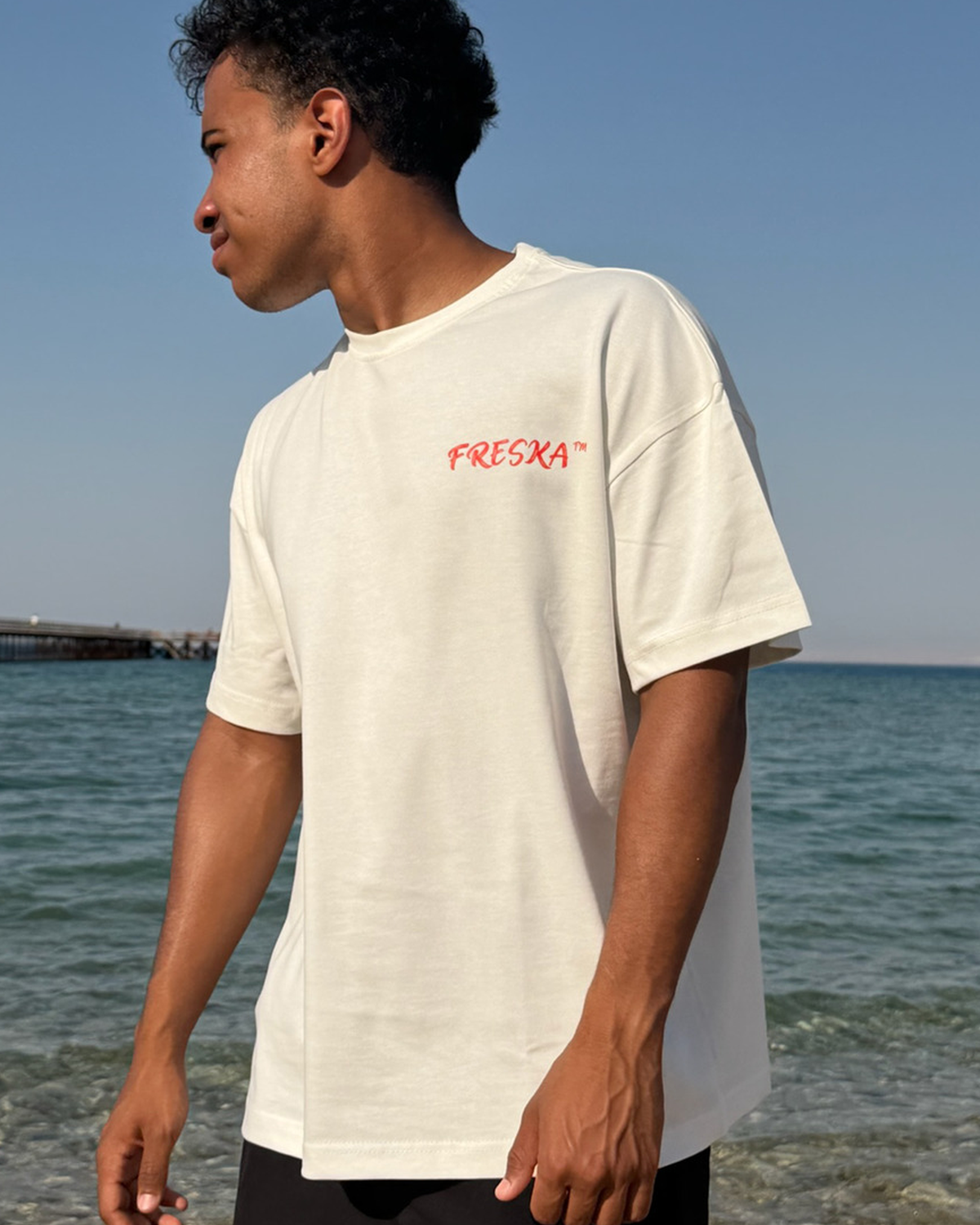 Freska oversized tee by Meilo in white — front chest print, boxy oversized fit, Egyptian streetwear