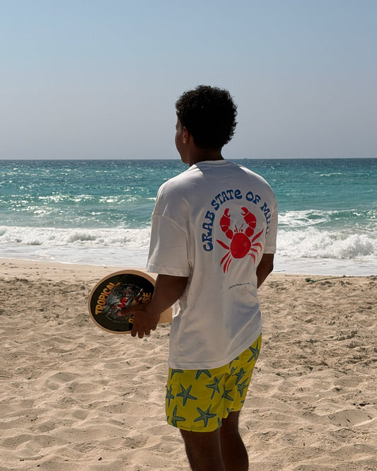 Crab State of Mind oversized tee by Meilo in white — red crab back print on the beach, boxy oversized fit, Egyptian streetwear